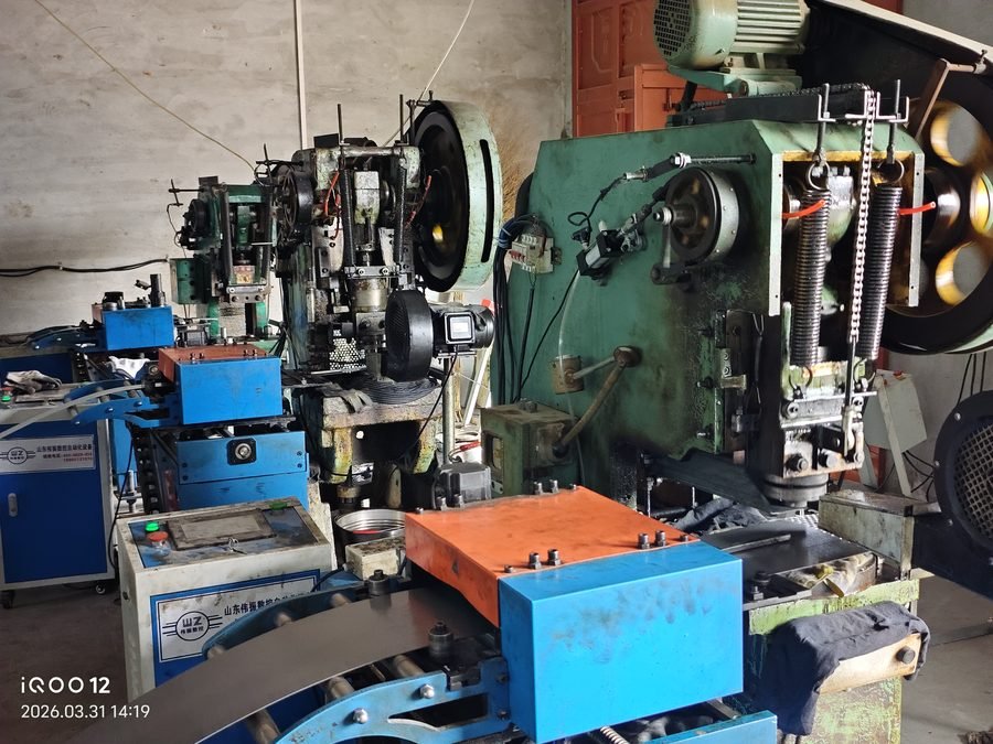 Automated press with coil feeder